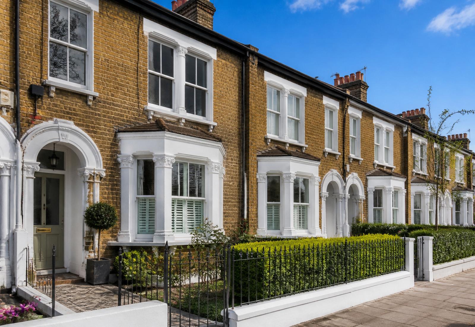 Row of freshly painted UK Victorian terraced houses